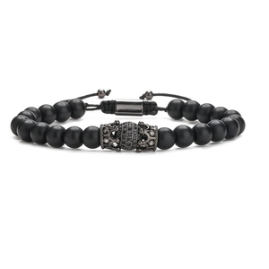 Adjustable black matte bead bracelet with gunmetal crown charm and micro-pave crystals