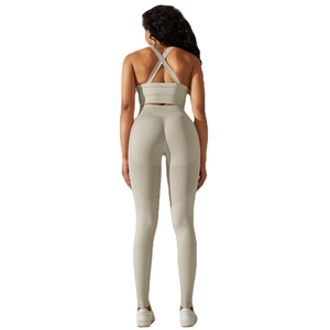 Seamless rib-knit yoga set with cross-back sports bra and high-waist leggings in sage green