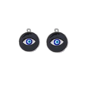 Close-up of circular black enamel charms with blue evil eye design and silver metal frame