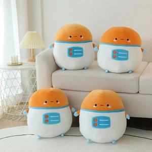 Close-up of four astronaut plushies with orange helmets on a soft cream fabric sofa