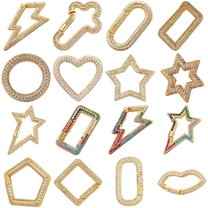 Collection of 16 gold plated zircon jewelry connectors in lightning, heart, and star shapes