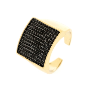 Macro detail of the square curved 18K gold ring featuring pavé set black cubic zirconia