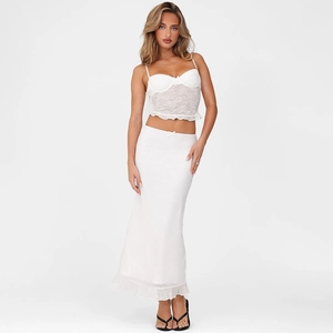 Detailed view of white lace patchwork camisole and matching slim fit maxi skirt