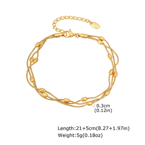 Detail view of triple-layer gold snake chain anklet with size and weight specifications