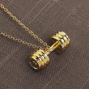 Golden mini dumbbell pendant necklace with fine chain for fitness enthusiasts
