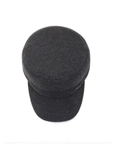 Draufsicht auf dunkelgraue Flatcap mit Fleecefutter und strukturierter Wolltextur