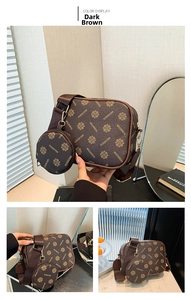 Detail view of brown crossbody camera bag set with logo print and round coin purse pouch