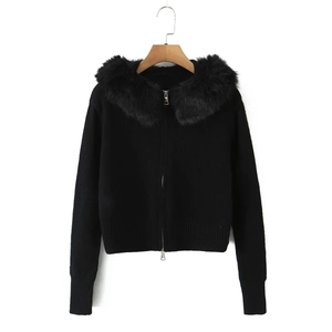 Women's black knit cardigan with faux fur collar and central zipper closure