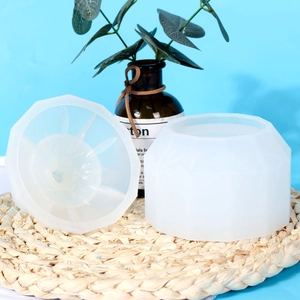 Detailed view of translucent cylindrical geometric faceted silicone storage box mold