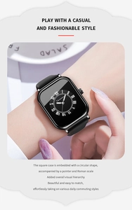 Close-up of VavaVoom square quartz watch with black silicone strap and Roman numerals