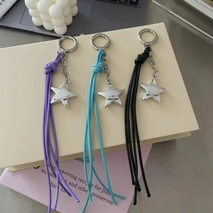 Y2K vintage star tassel keychain for bags in purple, cyan, and black minimalist style
