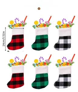 Plaid Christmas stocking ornaments in red, green and grey with faux fur trim