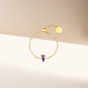 Close-up of S925 silver adjustable chain ring with a pear-cut purple zircon stone