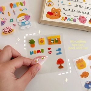 Detail of cute transparent PET cartoon stickers showing easy peel-and-stick application