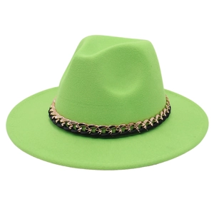 Macro shot of bright green felt fedora hat featuring a gold chain and black leather band