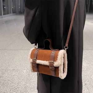 Chic brown plush cylinder handbag with faux fur trim and leather strap for women
