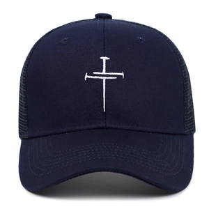 Navy blue trucker cap with embroidered nail cross and breathable mesh back panel