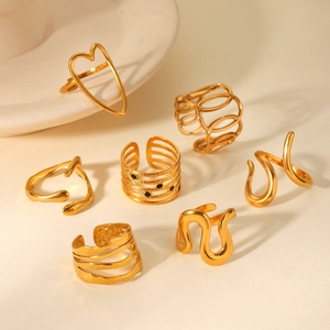 Set of seven minimalist 18K gold plated stainless steel adjustable rings for women