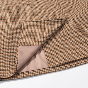 Short brown houndstooth jacket for women featuring a stand collar and thick wool texture