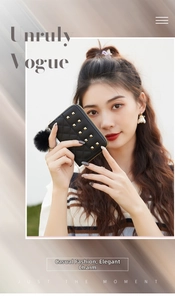 Detail of black quilted wallet featuring gold square studs and a plush pompom charm