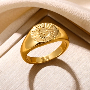 Detailed macro view of S925 hallmark on a vintage 18K gold sun smiley face signet ring