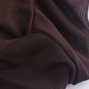 Macro shot of dark brown fine mesh fabric showing high-density knitted texture and elasticity