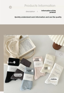 Flat lay of soft knit calf socks in six pastel colors including blue, pink and white