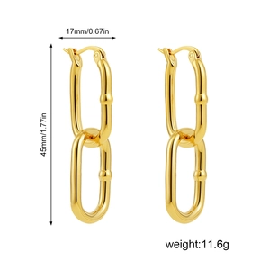 Detail view of U-shaped gold earrings with precise dimensions 17mm width and 45mm height
