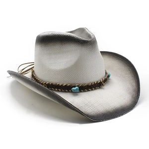 Detailed straw weave texture on western cowboy hat with turquoise heart decorations