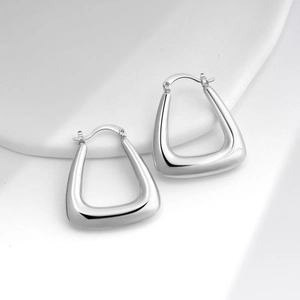 Polished silver U-shaped hollow earrings with a minimalist geometric design for women