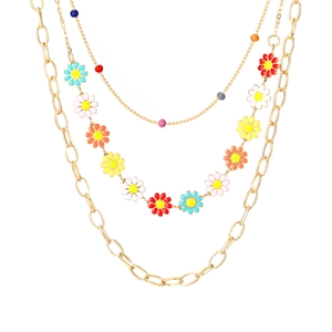 Boho layered gold necklace with colorful daisy charms on bead and link chains