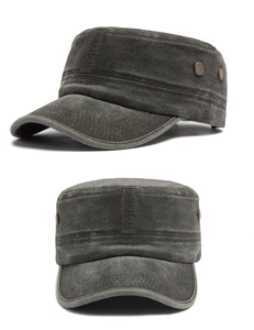 Detail of washed cotton cadet cap featuring vintage copper eyelets and textured canvas
