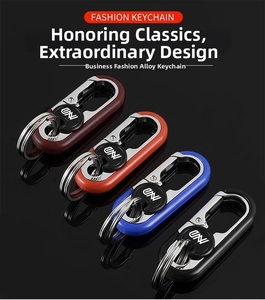 Detail showing high-end zinc alloy keychains in four colors with a metallic polished finish