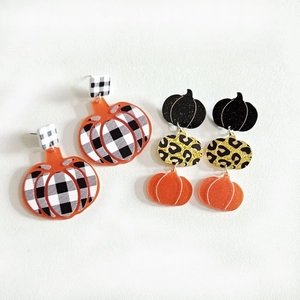 Acrylic Halloween pumpkin earrings featuring checkered patterns and leopard print designs