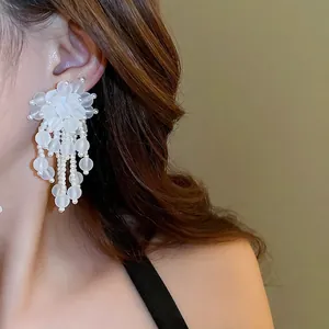 Elegant white acrylic flower tassel earrings with pearls and silver needle for women