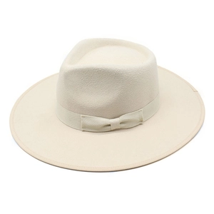 Detail of cream wool fedora hat showing textured felt material and decorative ribbon bow