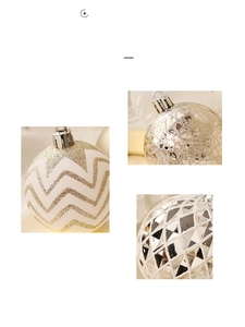 Detail of champagne gold and white Christmas balls with glitter waves and textured patterns