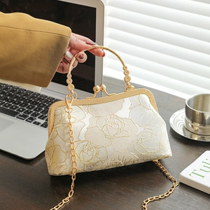 Elegant off-white cheongsam handbag with gold floral embroidery and metal handle