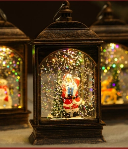 Close-up of vintage bronze water lantern with glitter and warm LED festive scene