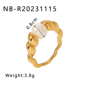 Detail of twisted gold stainless steel ring with 8mm pearl centerpiece and weight specs