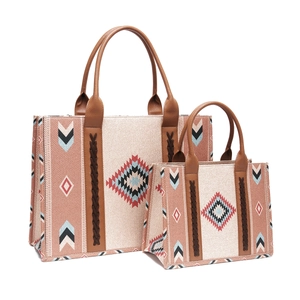 Bohemian geometric woven tote bag set with brown faux leather handles on white background