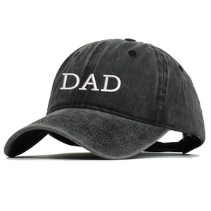 Close-up of vintage washed grey baseball cap featuring white DAD embroidery detail