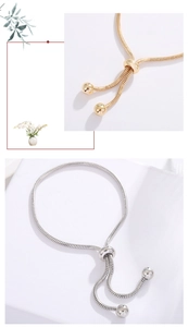 Detail of adjustable copper snake chain bracelets with sliding bead clasps in gold and silver