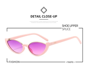 Detailed close-up of pink cat eye sunglasses with gradient purple lenses and gold hinges