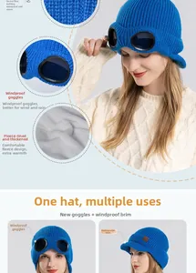 Detalles del gorro de punto azul con forro polar y gafas cortavientos integradas