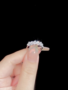 Close-up of S925 sterling silver ring with rectangular baguette and round cubic zirconia