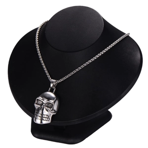 3D silver skull pendant necklace in stainless steel on black neck display stand