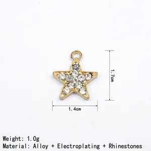 Detail of star-shaped pendant with crystals measuring 1.7cm by 1.4cm in gold plating