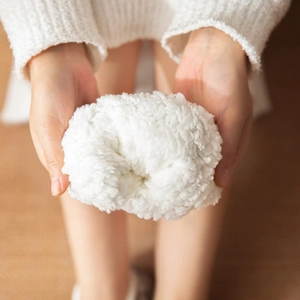 Thick white fluffy floor socks for winter with soft plush faux fur and warm thermal texture