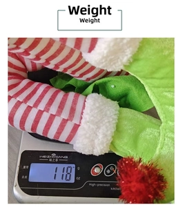 Detailed view of Christmas elf plush leg decoration weighing approximately 118 grams